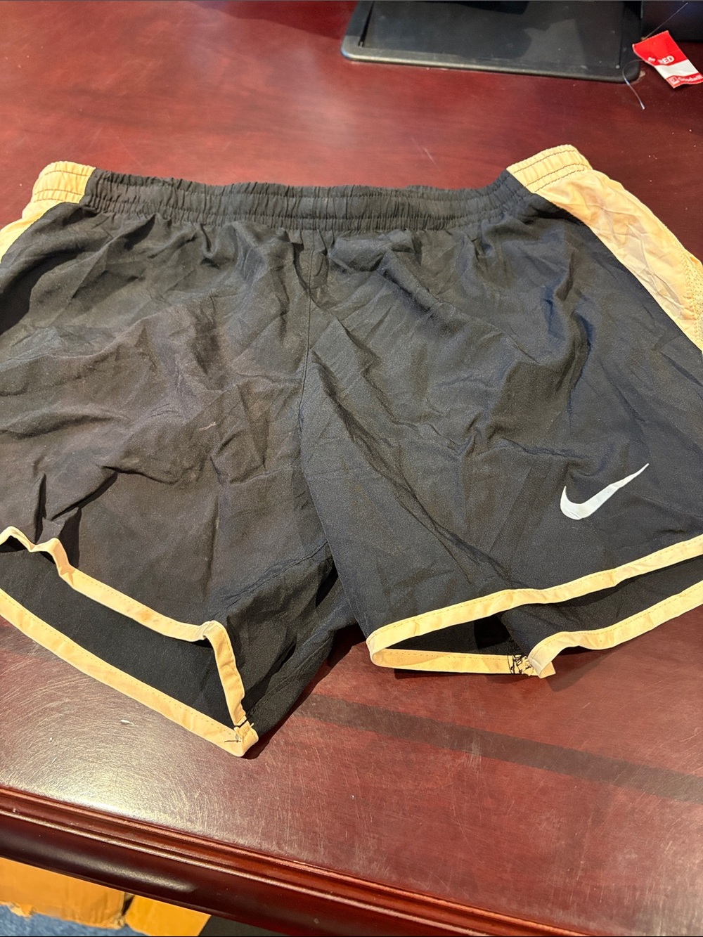 Nike Women’s Black Athletic Shorts with Tan Trim